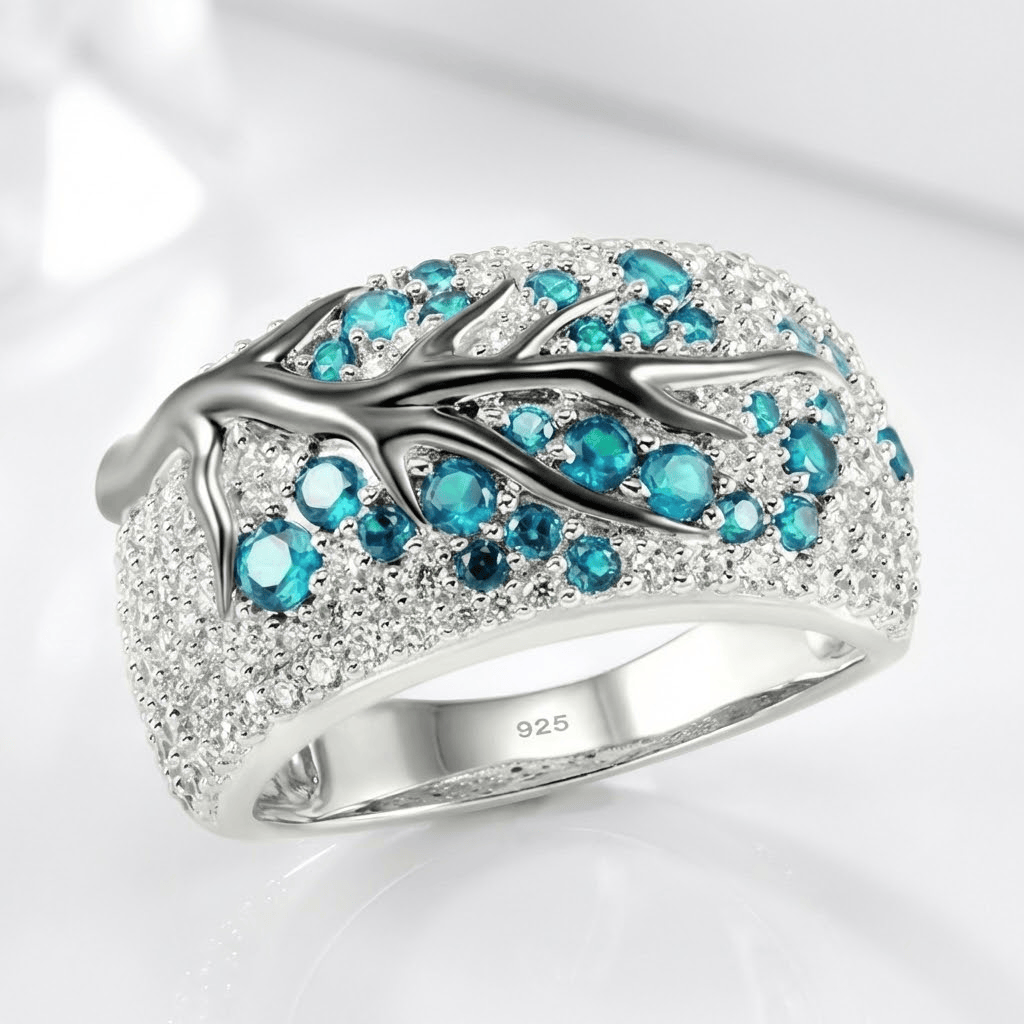 SILVER BLUE TOPAZ LEAF RING
